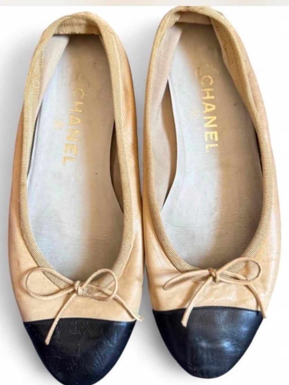 CHANEL Beige and Black Two-Tone Leather Ballet Flats